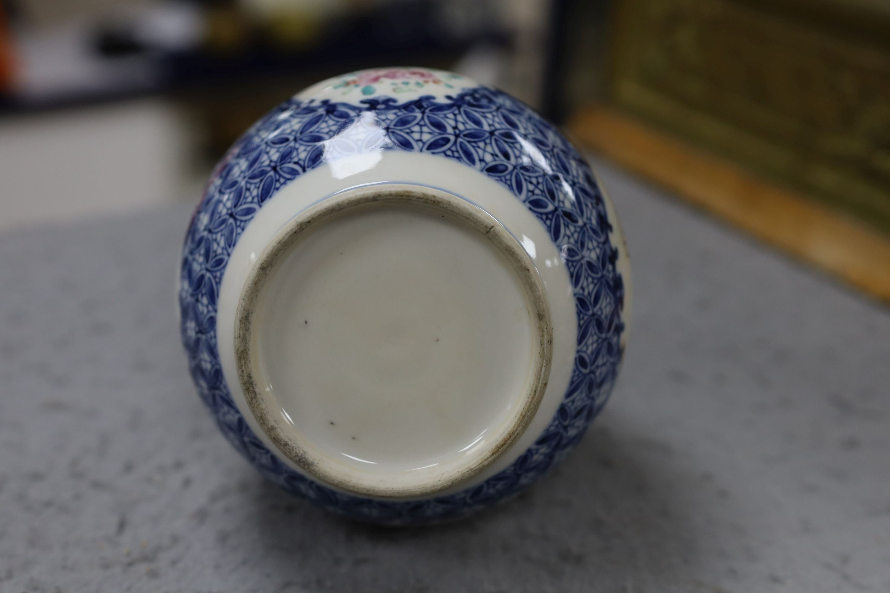 A pair Samson of Paris vases in the Chinese famille verte style and a Chinese Qianlong famille rose garlic neck vase with blue panelling motif, tallest 26cm